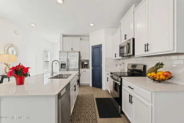 a living room with furniture and a table
