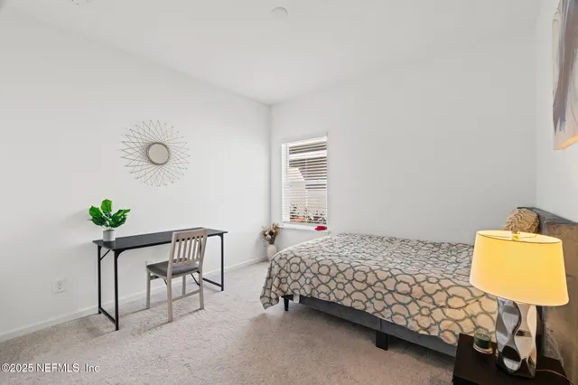 a view of a house with swimming pool and a yard