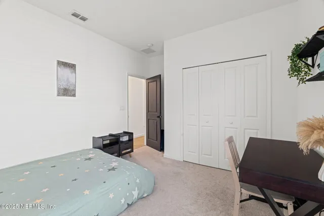 a view of a house with swimming pool and a yard