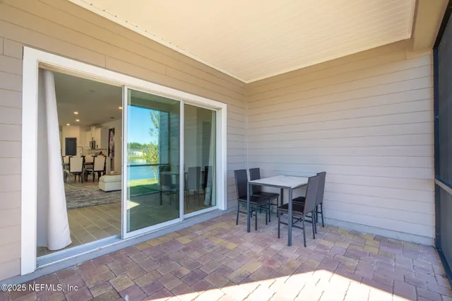 a view of a swimming pool with a yard