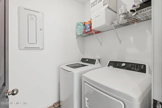 a kitchen with a table and chairs in it