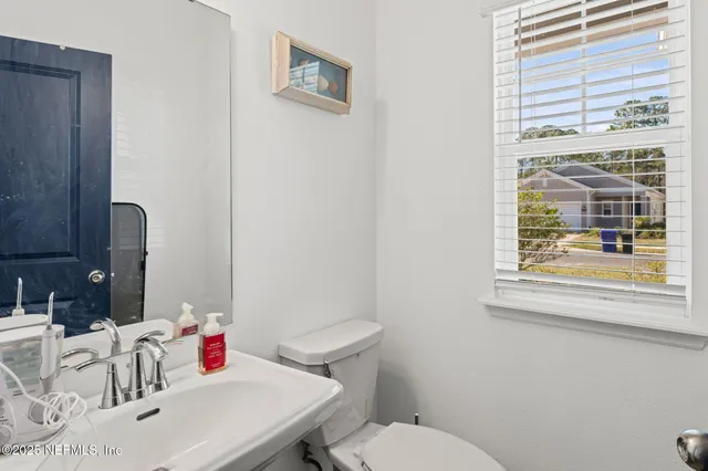 a kitchen with cabinets a sink and appliances