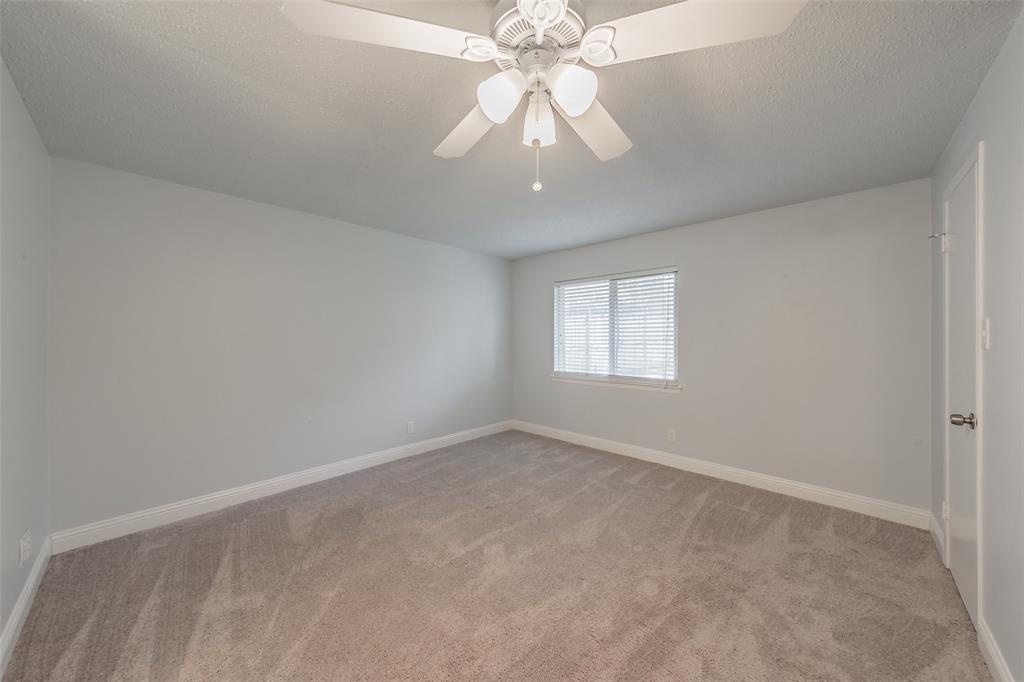 1301 Cedar Ridge Terrace Euless, TX 76039 - Photo 23 of 31 Secondary bedrooms feature carpet and ceiling fans. Two inch blinds throughout the house.