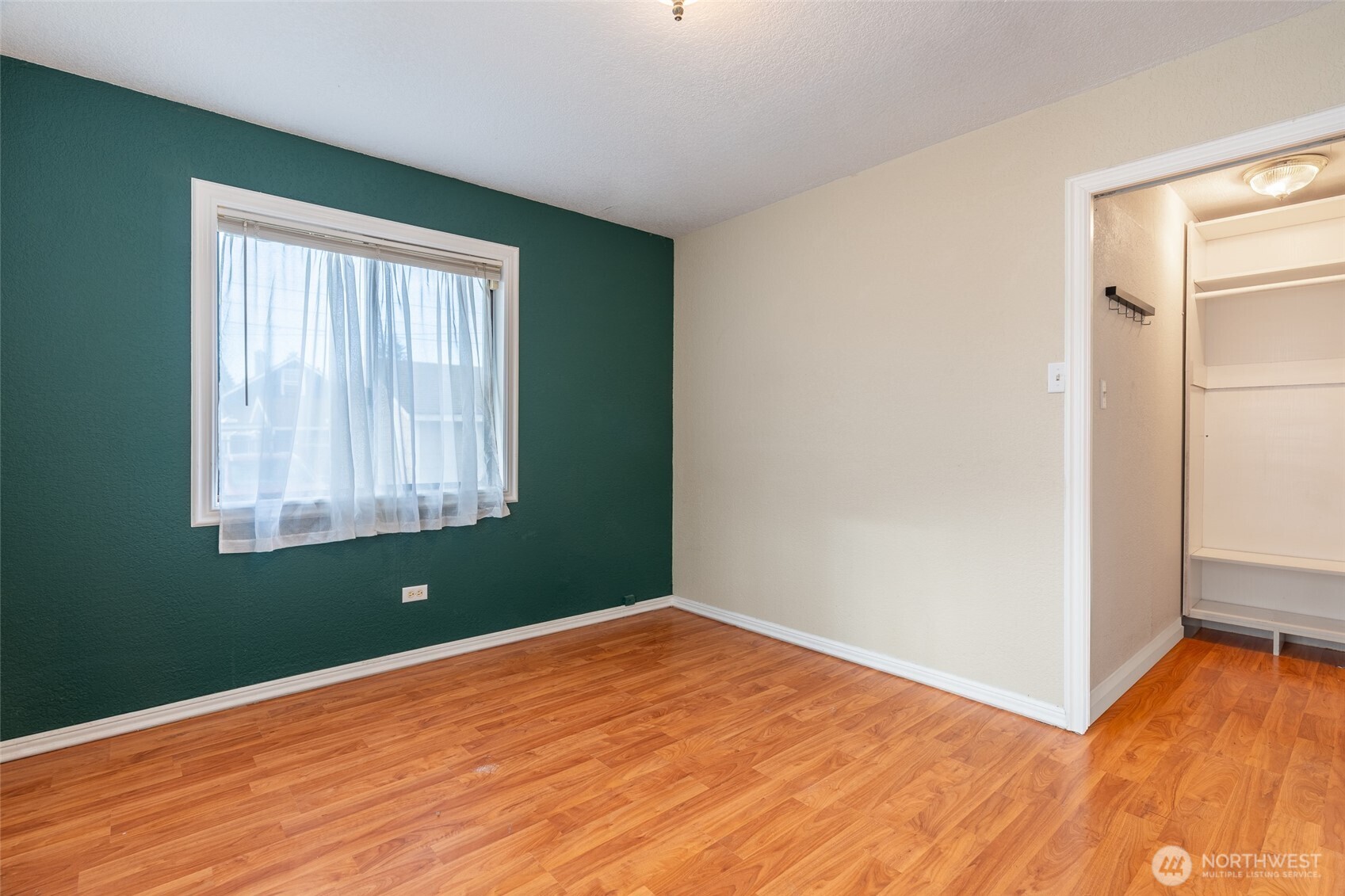 3584 East K Street Tacoma, WA 98404 - Photo 11 of 30 a view of a room with wooden floor and windows