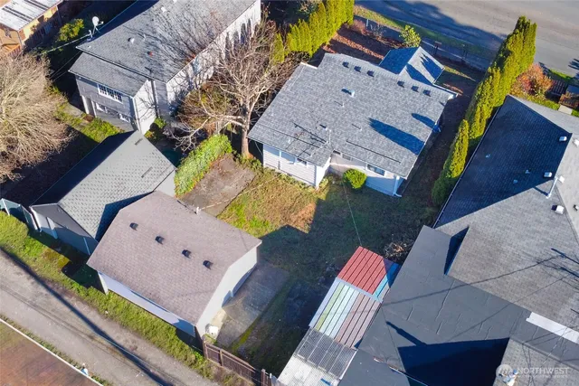 an aerial view of a house with a garden