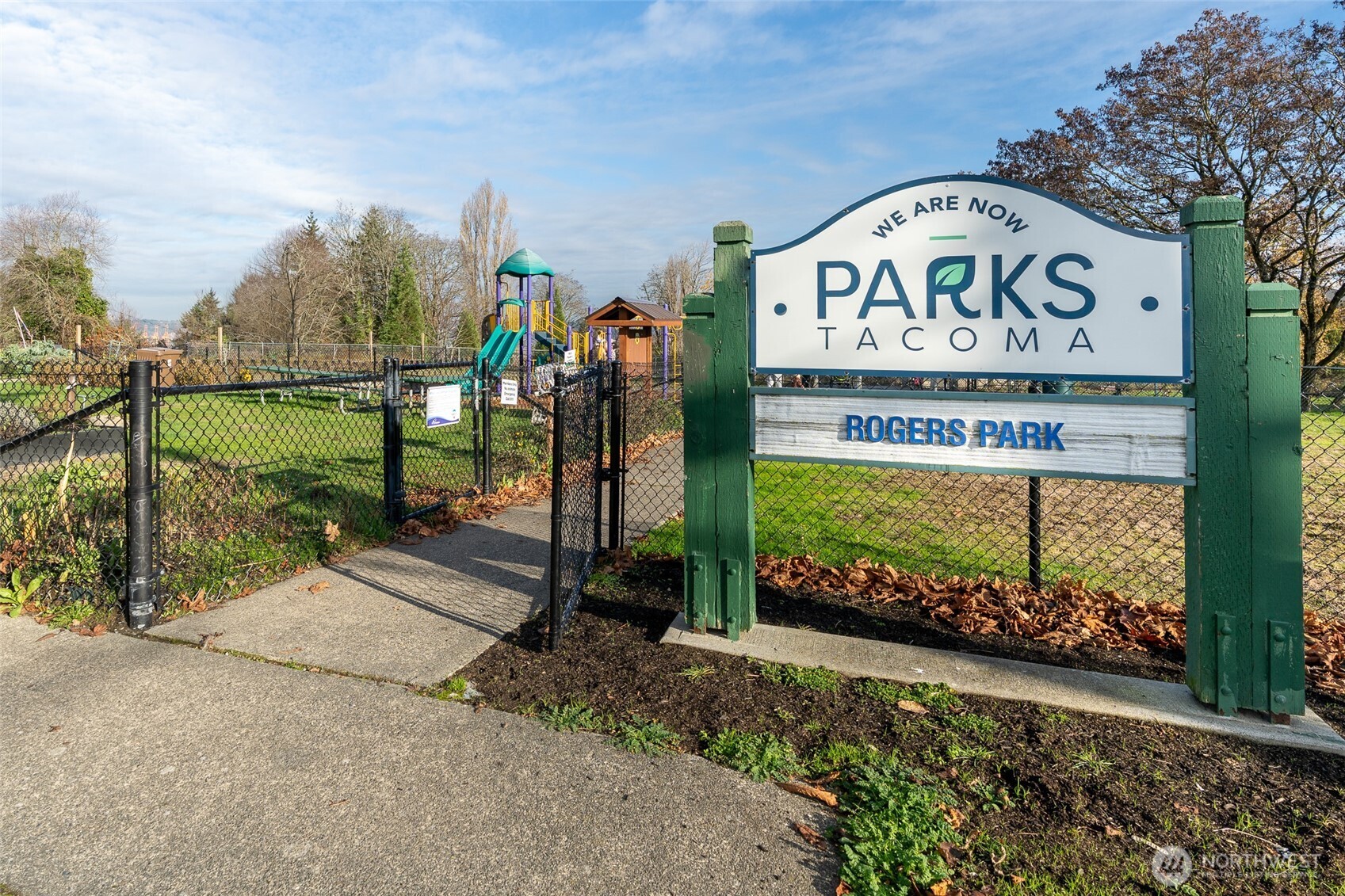 3584 East K Street Tacoma, WA 98404 - Photo 28 of 30 a view of a street sign under a tree