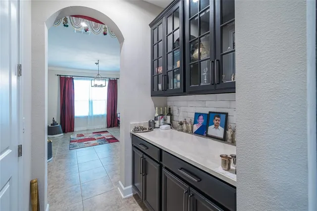 a workspace with furniture and a window