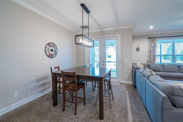a view of walk in closet with clothes