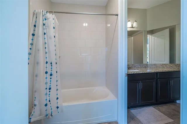 a view of a park with swings and slides