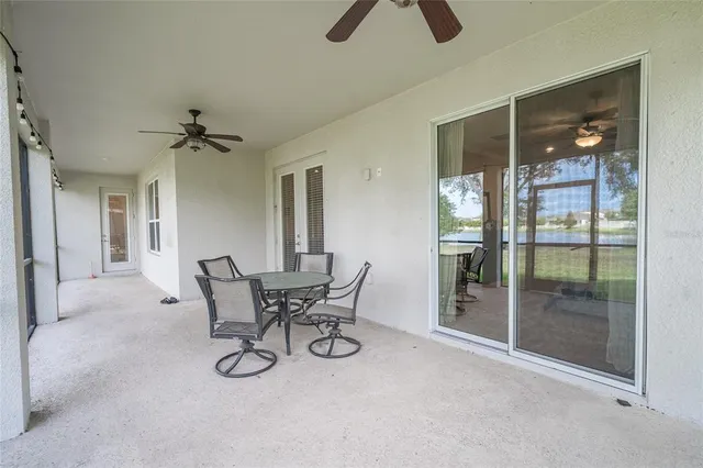 an aerial view of a house with garden space seating area and outdoor seating