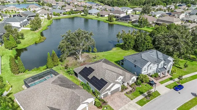 a kitchen with a sink and a refrigerator
