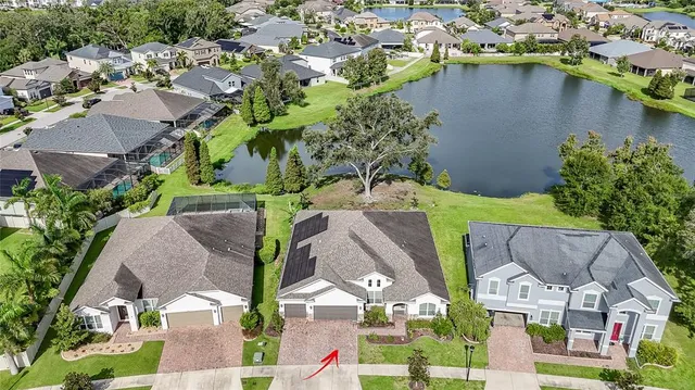 a kitchen with stainless steel appliances a stove and refrigerator