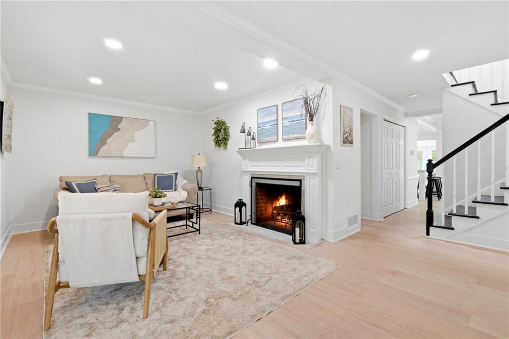 2955 Brookfield Circle Cumming, GA 30040 - Photo 20 of 89 a living room with furniture and a fireplace