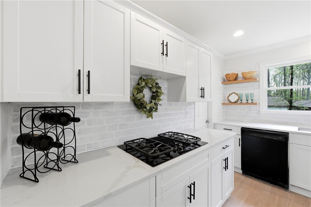 2955 Brookfield Circle Cumming, GA 30040 - Photo 27 of 89 a kitchen with a stove a sink and a stove