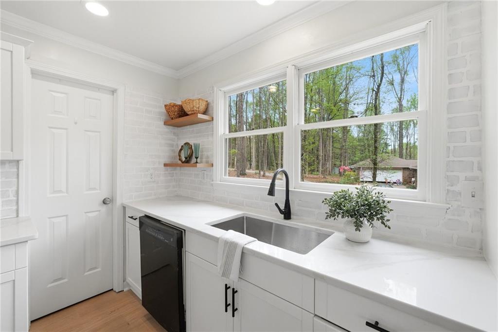 2955 Brookfield Circle Cumming, GA 30040 - Photo 28 of 89 a kitchen with a sink and a window
