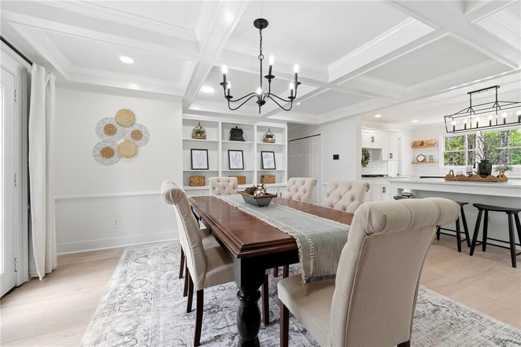 2955 Brookfield Circle Cumming, GA 30040 - Photo 33 of 89 a view of a a dining room with furniture window and wooden floor