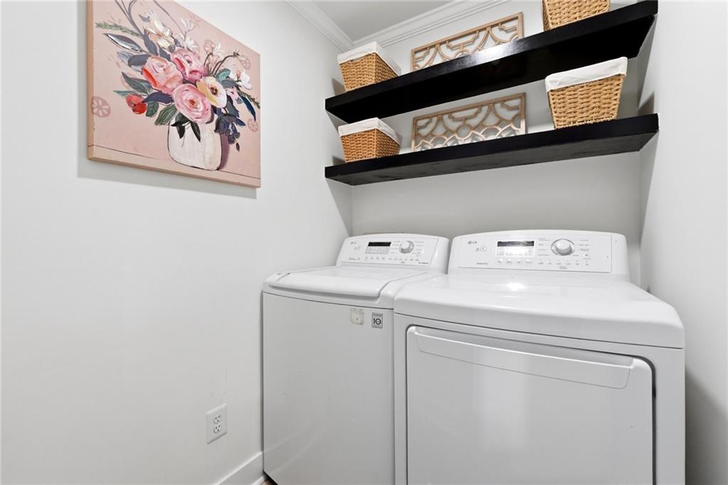 2955 Brookfield Circle Cumming, GA 30040 - Photo 36 of 89 a utility room with dryer and washer