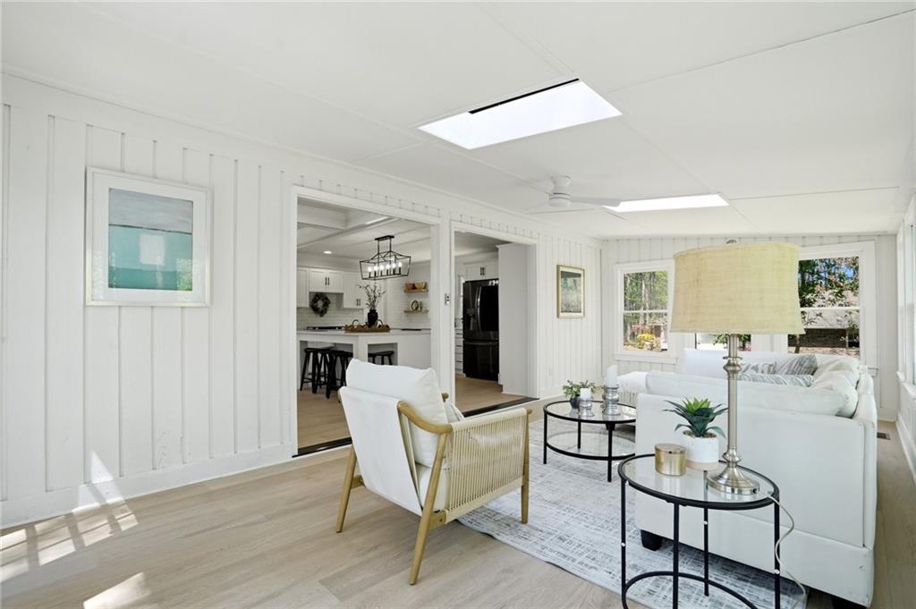 2955 Brookfield Circle Cumming, GA 30040 - Photo 37 of 89 a living room with furniture and wooden floor