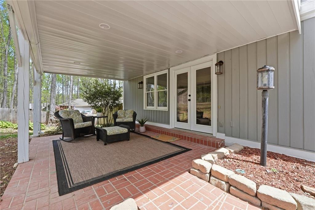2955 Brookfield Circle Cumming, GA 30040 - Photo 5 of 89 a living room with furniture and a large window