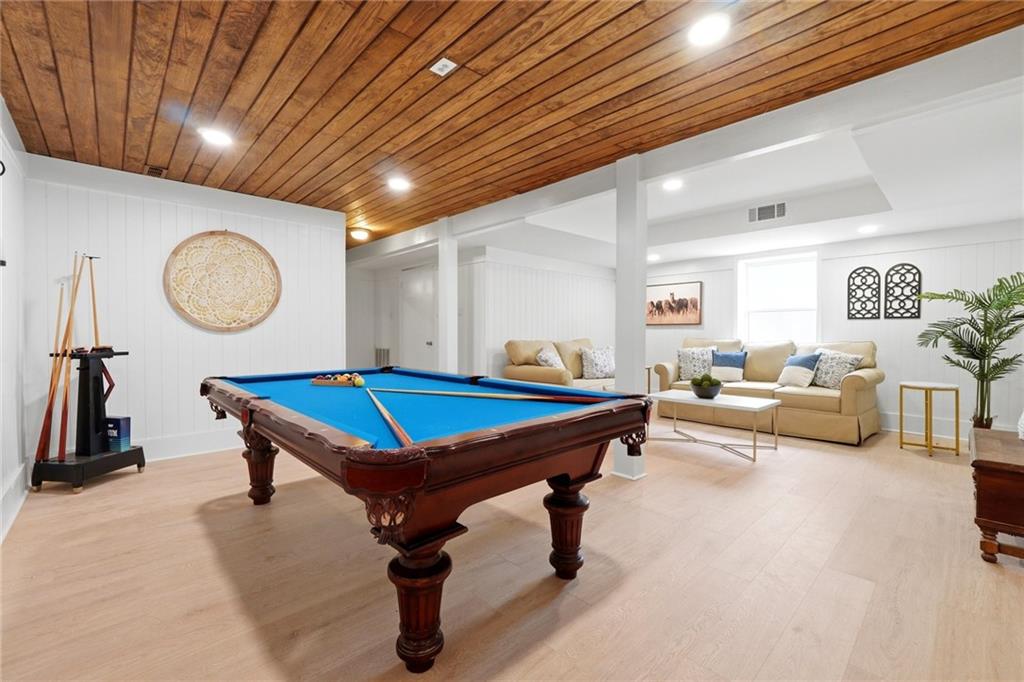 2955 Brookfield Circle Cumming, GA 30040 - Photo 60 of 89 a living room with furniture gym equipment and a large window