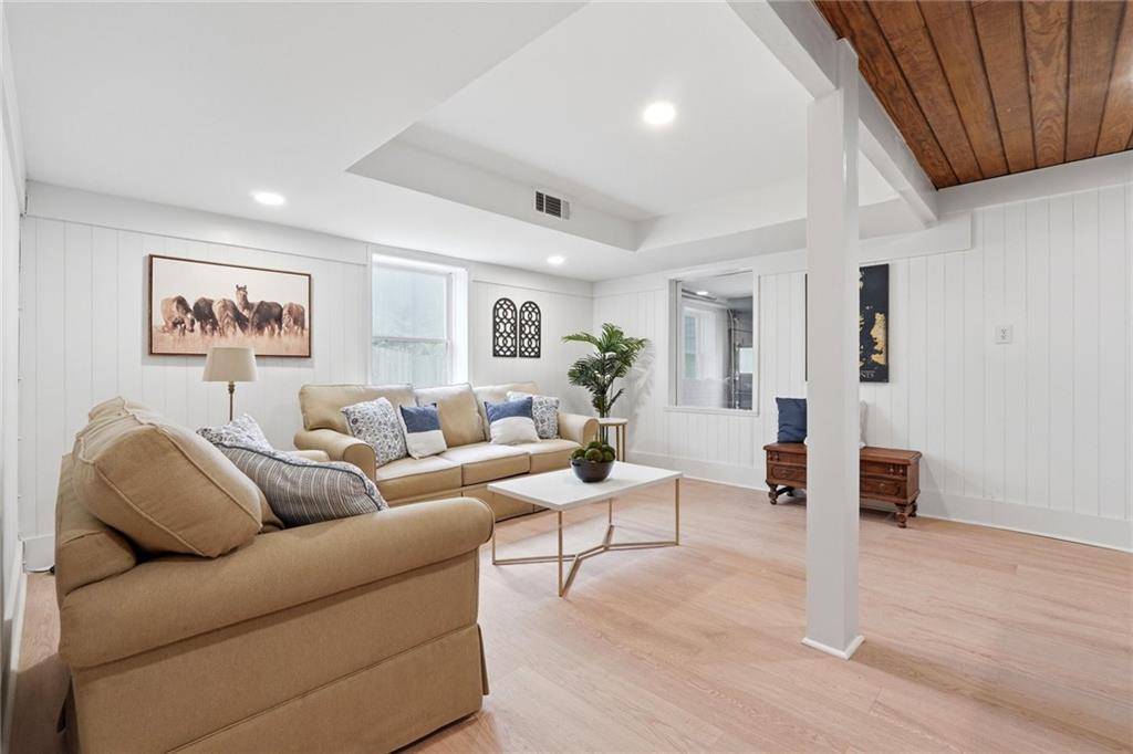 2955 Brookfield Circle Cumming, GA 30040 - Photo 61 of 89 a living room with furniture and wooden floor
