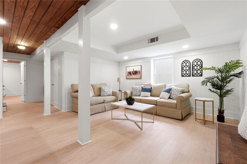 2955 Brookfield Circle Cumming, GA 30040 - Photo 62 of 89 a living room with furniture and a large window