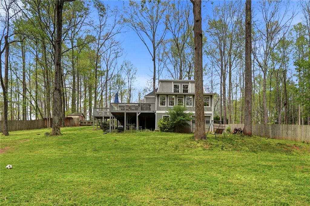 2955 Brookfield Circle Cumming, GA 30040 - Photo 72 of 89 a view of a house with a yard