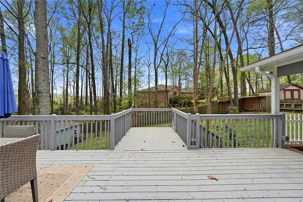 2955 Brookfield Circle Cumming, GA 30040 - Photo 83 of 89 a view of balcony with wooden floor and fence