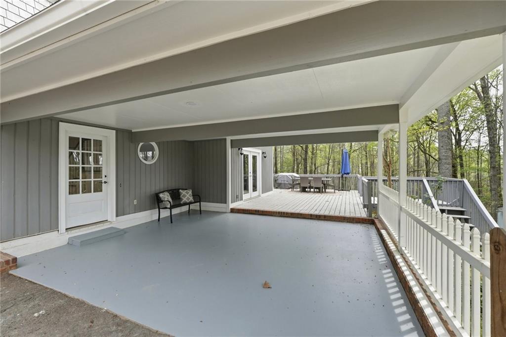 2955 Brookfield Circle Cumming, GA 30040 - Photo 89 of 89 a view of front door and bedroom with furniture