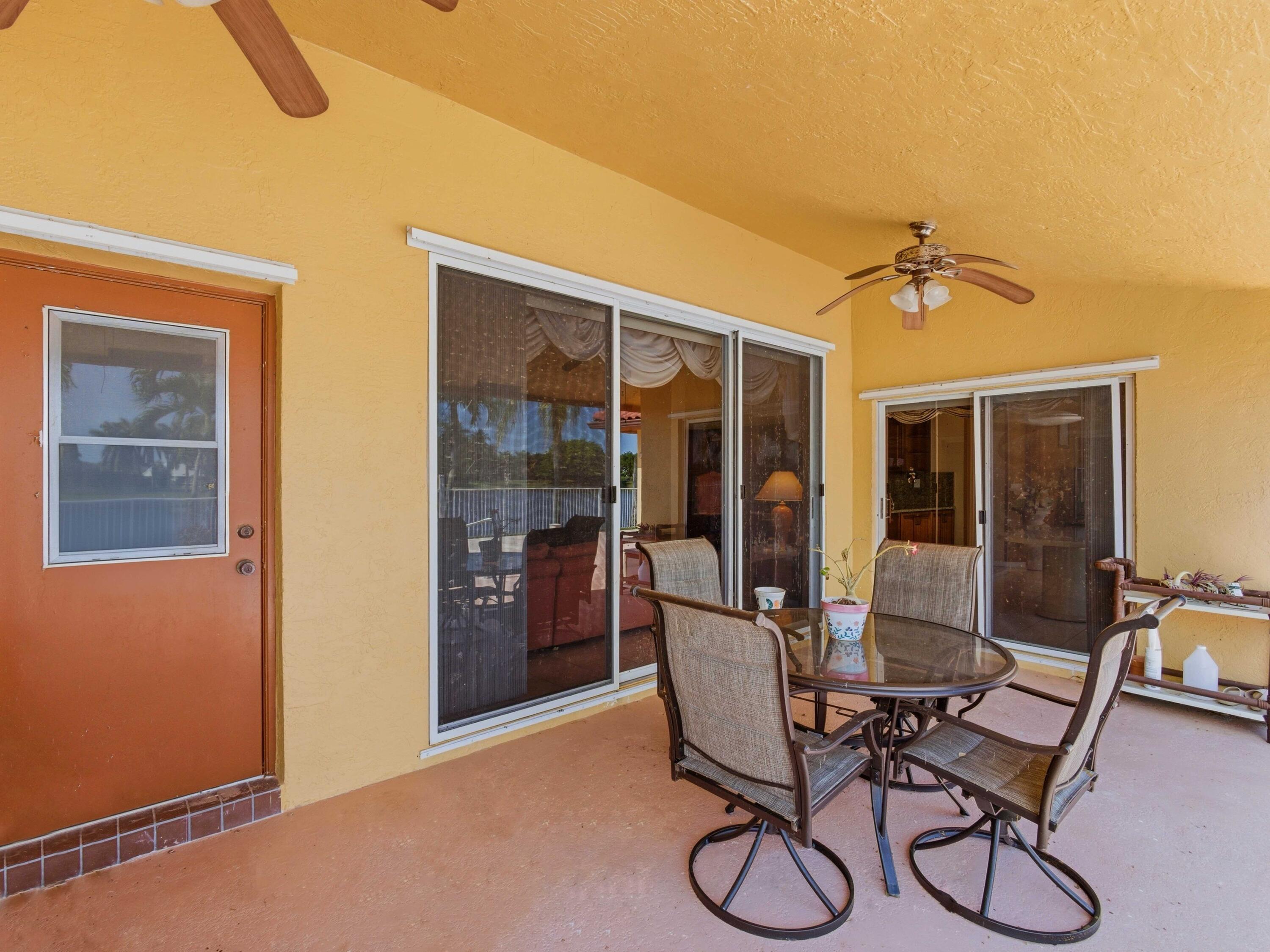7180 Lockwood Road Lake Worth, FL 33467 - Photo 24 of 54 Covered Patio