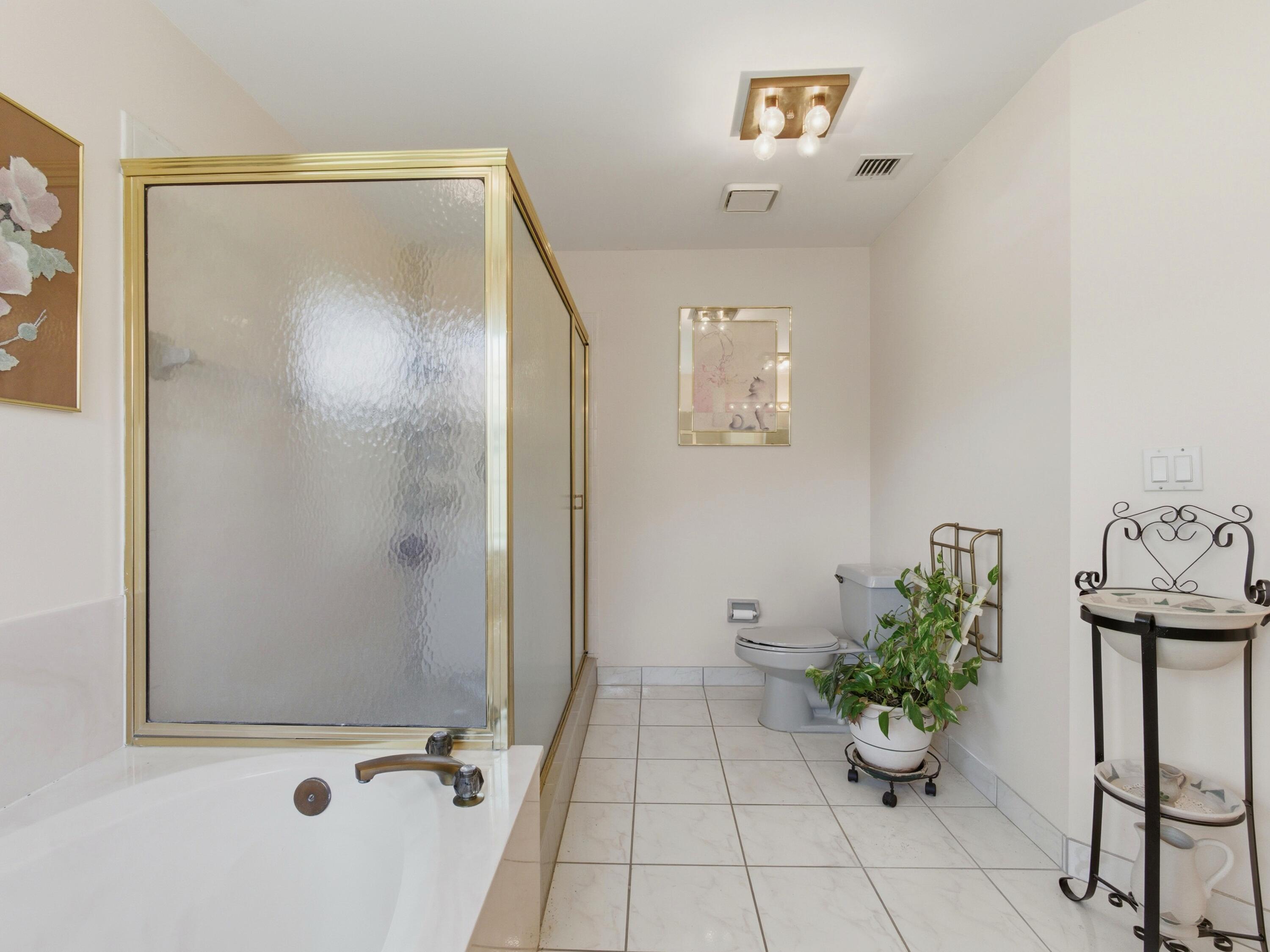 7180 Lockwood Road Lake Worth, FL 33467 - Photo 38 of 54 Primary Bathroom
