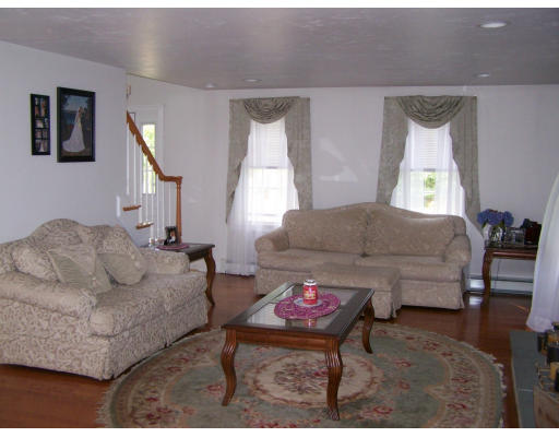 223 County Road Rochester, MA 02576 - Photo 6 of 25 a living room with furniture and a window
