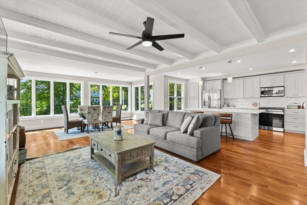 1366 Gardners Neck Road Swansea, MA 02777 - Photo 13 of 35 a living room with furniture and a large window