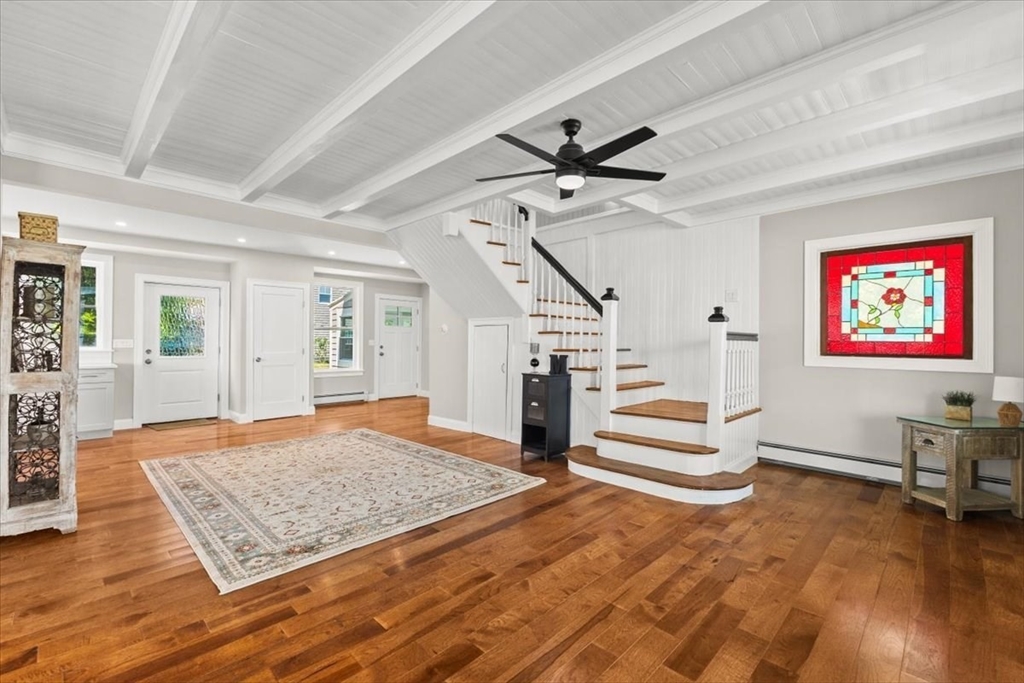 1366 Gardners Neck Road Swansea, MA 02777 - Photo 17 of 35 a living room with furniture and wooden floor