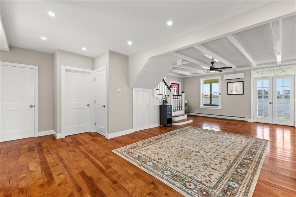 1366 Gardners Neck Road Swansea, MA 02777 - Photo 18 of 35 a bedroom with a bed and a dresser