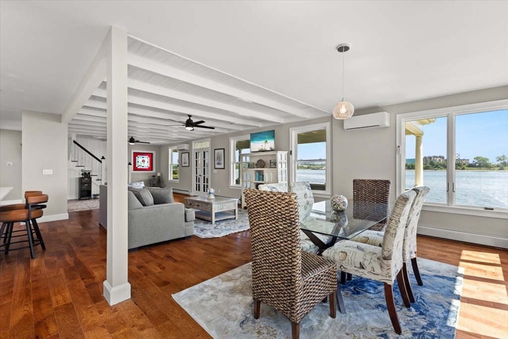 1366 Gardners Neck Road Swansea, MA 02777 - Photo 25 of 35 a living room with furniture and a fireplace