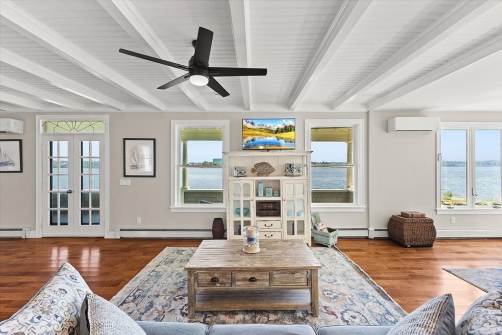 1366 Gardners Neck Road Swansea, MA 02777 - Photo 10 of 35 a living room with furniture and a window