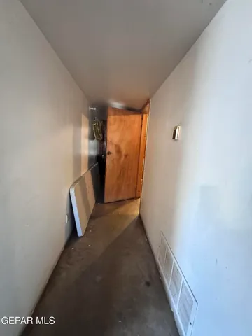 a stove top oven sitting inside of a kitchen
