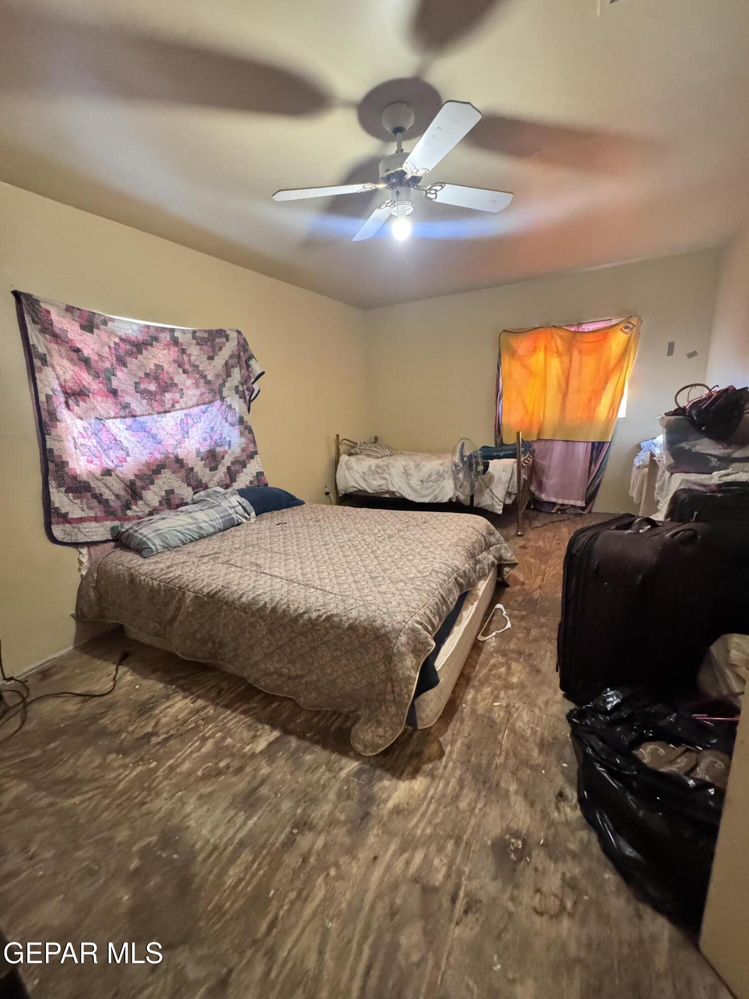 7045 1st Street Canutillo, TX 79835 - Photo 21 of 50 a bedroom with a bed and window
