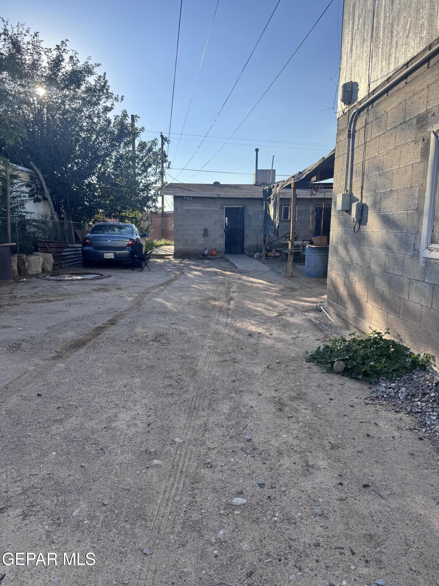 7045 1st Street Canutillo, TX 79835 - Photo 4 of 50 a car parked in front of house