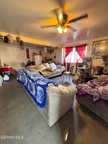 a view of a livingroom with furniture and a couch
