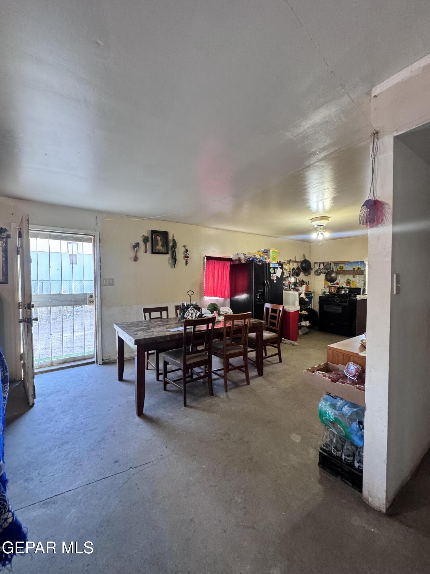7045 1st Street Canutillo, TX 79835 - Photo 9 of 50 a view of a livingroom with furniture and a couch