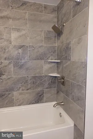 a bathroom with a bathtub