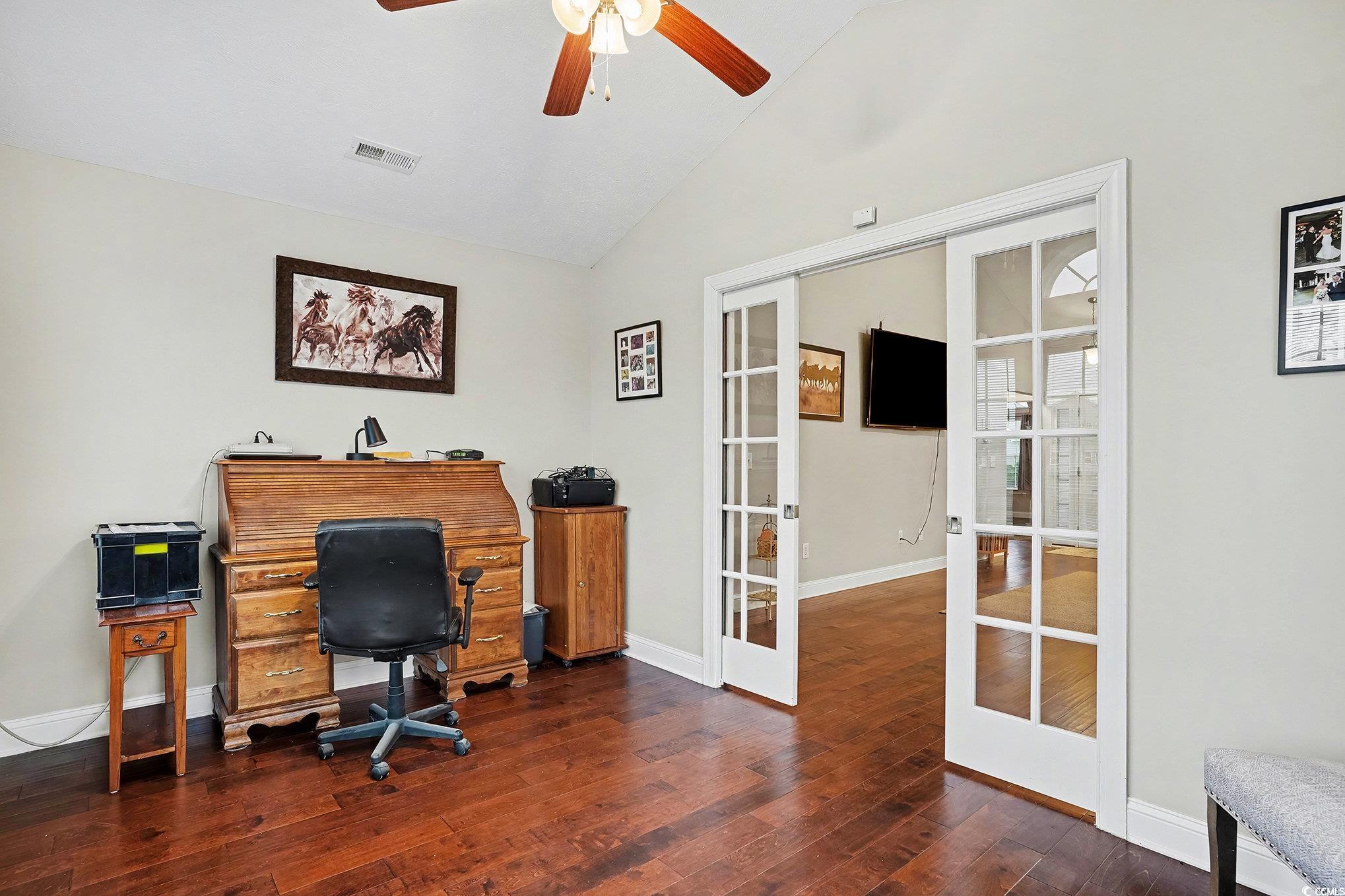 216 Camrose Way Myrtle Beach, SC 29588 - Photo 14 of 32 Home office featuring french doors, lofted ceiling, dark wood-style flooring, and ceiling fan