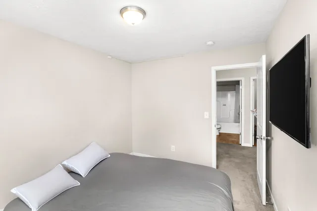 a view of bedroom and bathroom