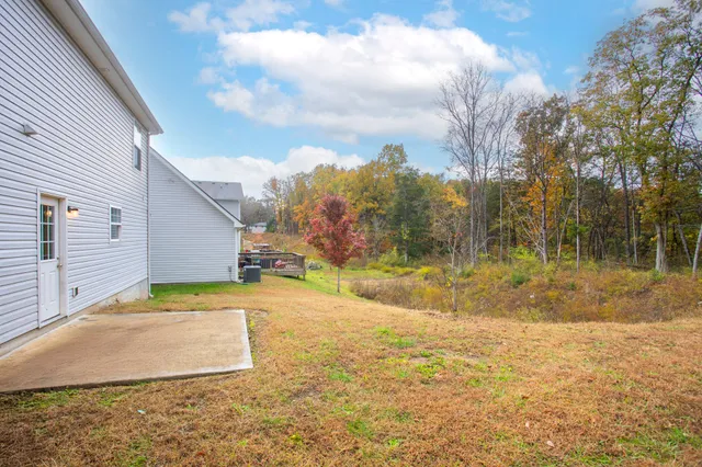 a view of back yard of the house