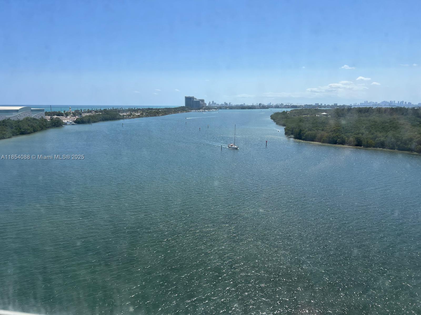 500 Bayview Drive, Unit 1120 Sunny Isles Beach, FL 33160 - Photo 19 of 46 a view of an ocean and beach