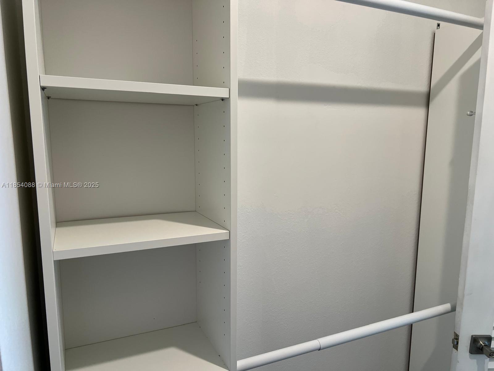 500 Bayview Drive, Unit 1120 Sunny Isles Beach, FL 33160 - Photo 25 of 46 a utility room with linen closet