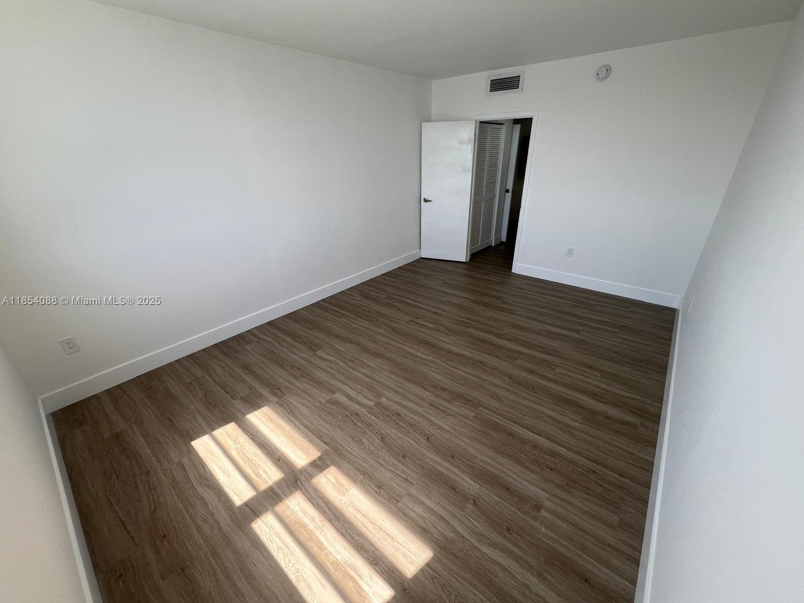 500 Bayview Drive, Unit 1120 Sunny Isles Beach, FL 33160 - Photo 36 of 46 a view of wooden floor