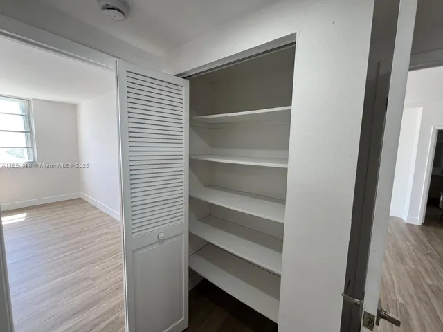 a view of a bathroom from the hallway